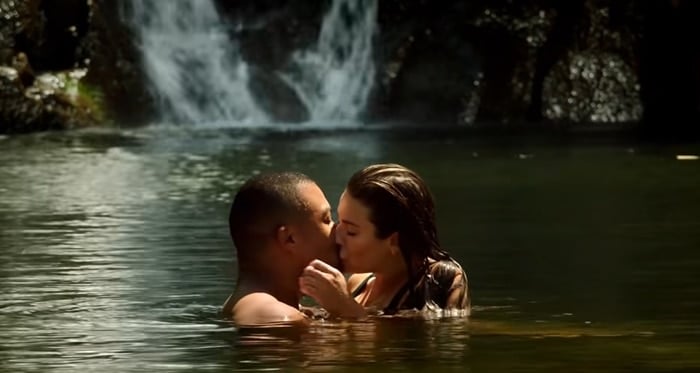 Lea Michele kissing her Same Time, Next Christmas co-star Charles Michael Davis in front of Waimea Falls on Oahu, Hawaii