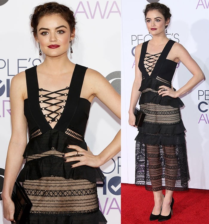 A closer look at Lucy Hale's captivating lace-up detail on her chic black lace Self-Portrait dress, an embodiment of intricate design and style