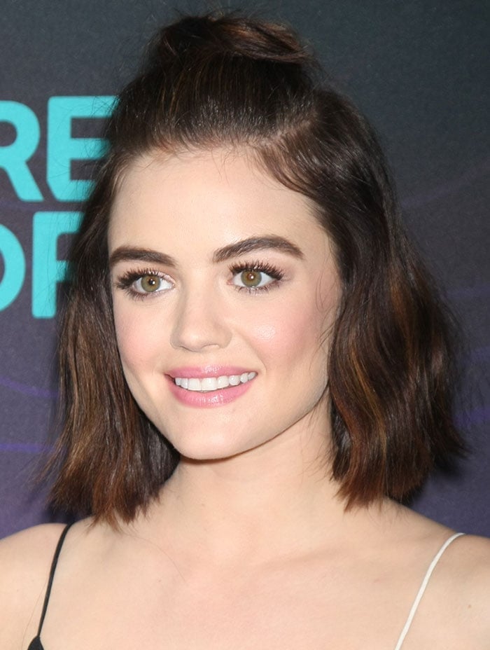 Lucy Hale wears her hair half-up and half-down