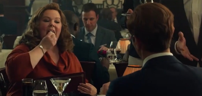 Melissa McCarthy tries to eat a hand towel in the action-comedy spy film Spy