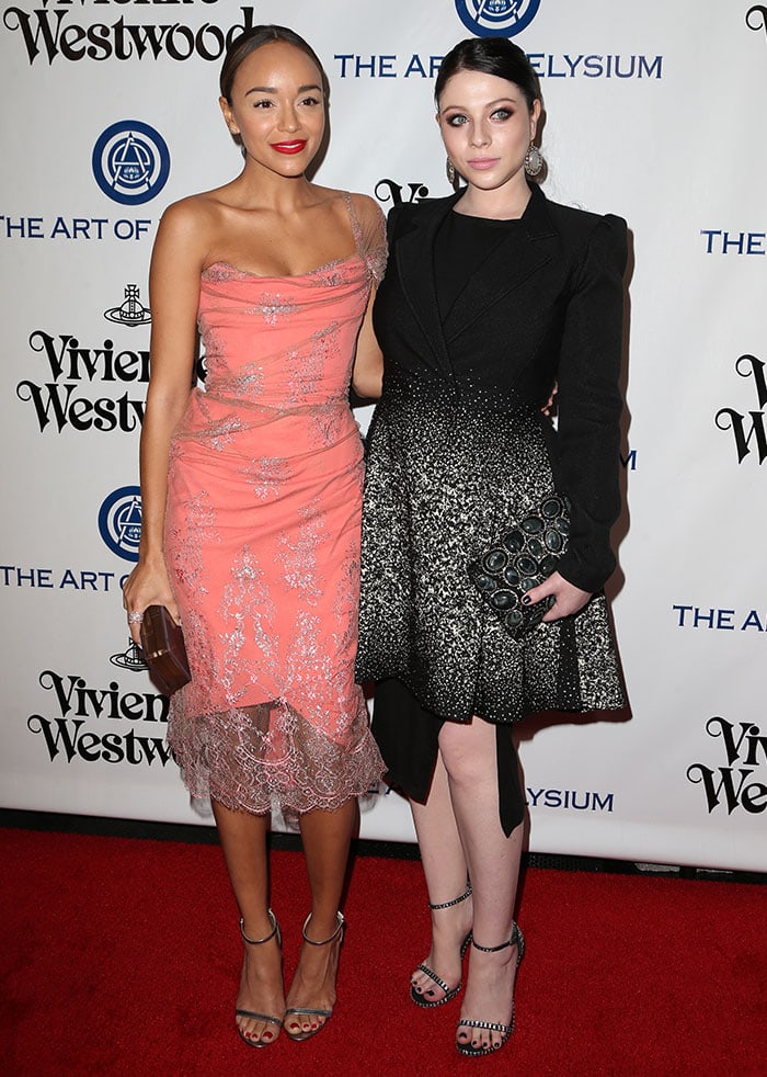 Ashley Madekwe and Michelle Trachtenberg pose for photos on the red carpet