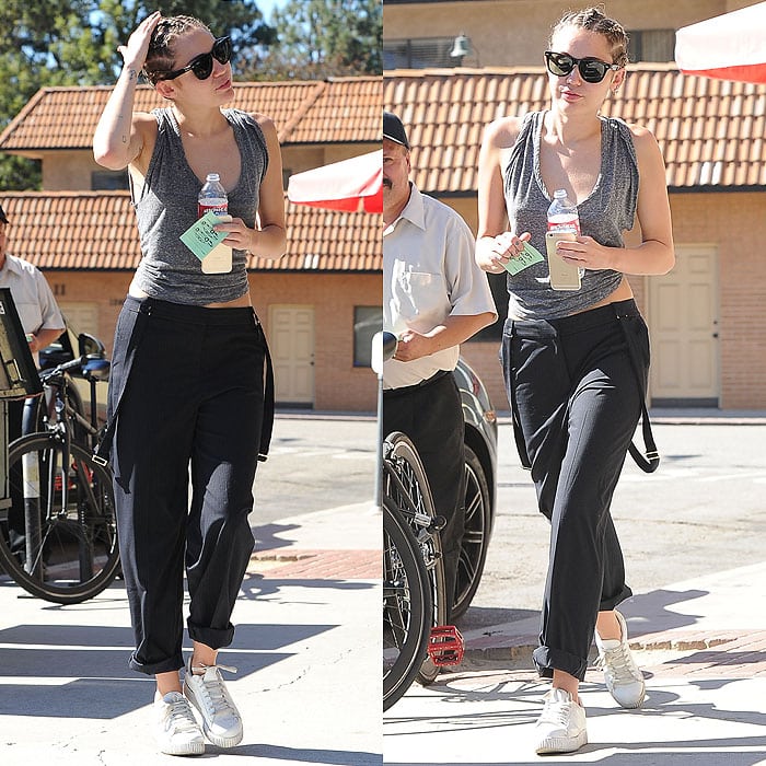Miley Cyrus wears trainers with well-fitting dress pants