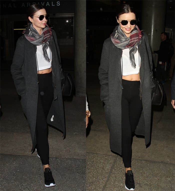 Miranda Kerr departs on a flight from Los Angeles International Airport in California on November 19, 2015