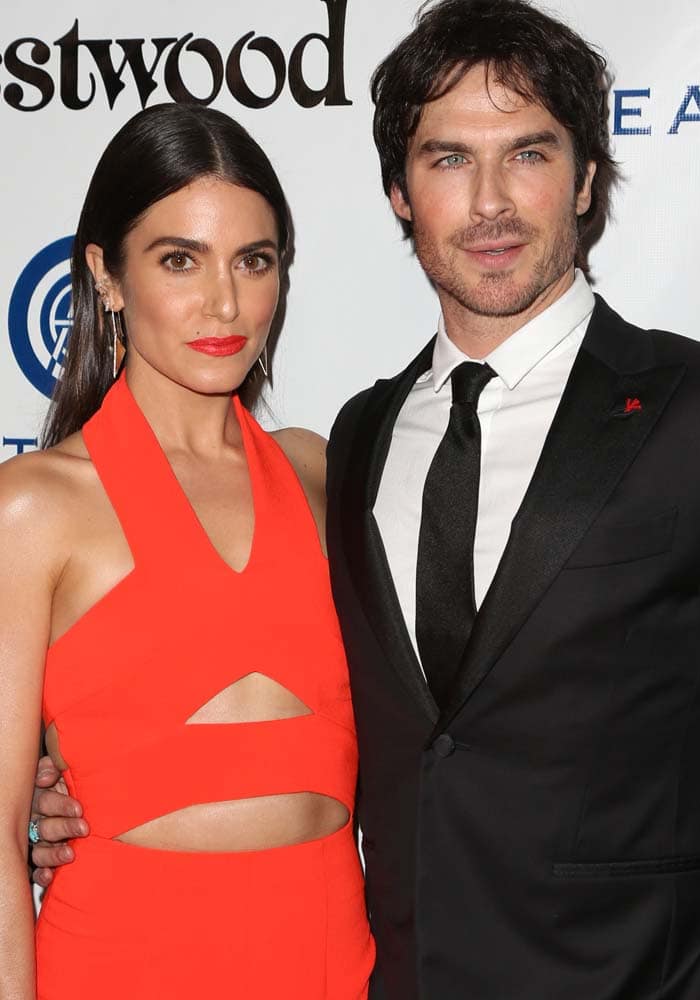 Nikki Reed and Ian Somerhalder pose for photos together on the red carpet