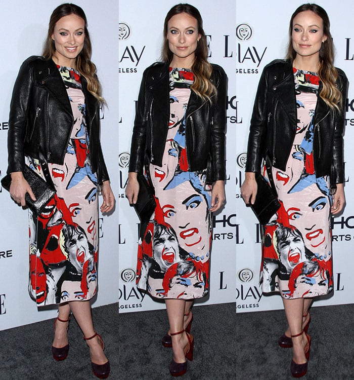 Olivia Wilde wears a blue-and-red Marc Jacobs dress under a black leather jacket