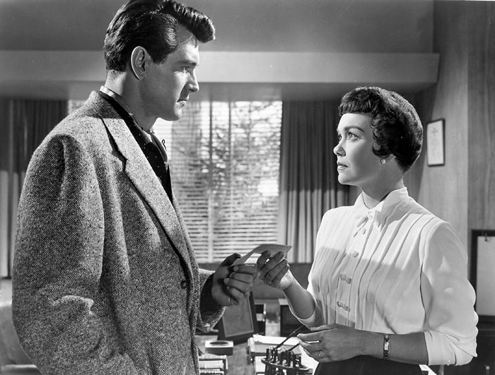 Rock Hudson (as Dr. Bob Merrick) and Jane Wyman (as Helen Phillips) in the 1954 Technicolor romantic drama film Magnificent Obsession