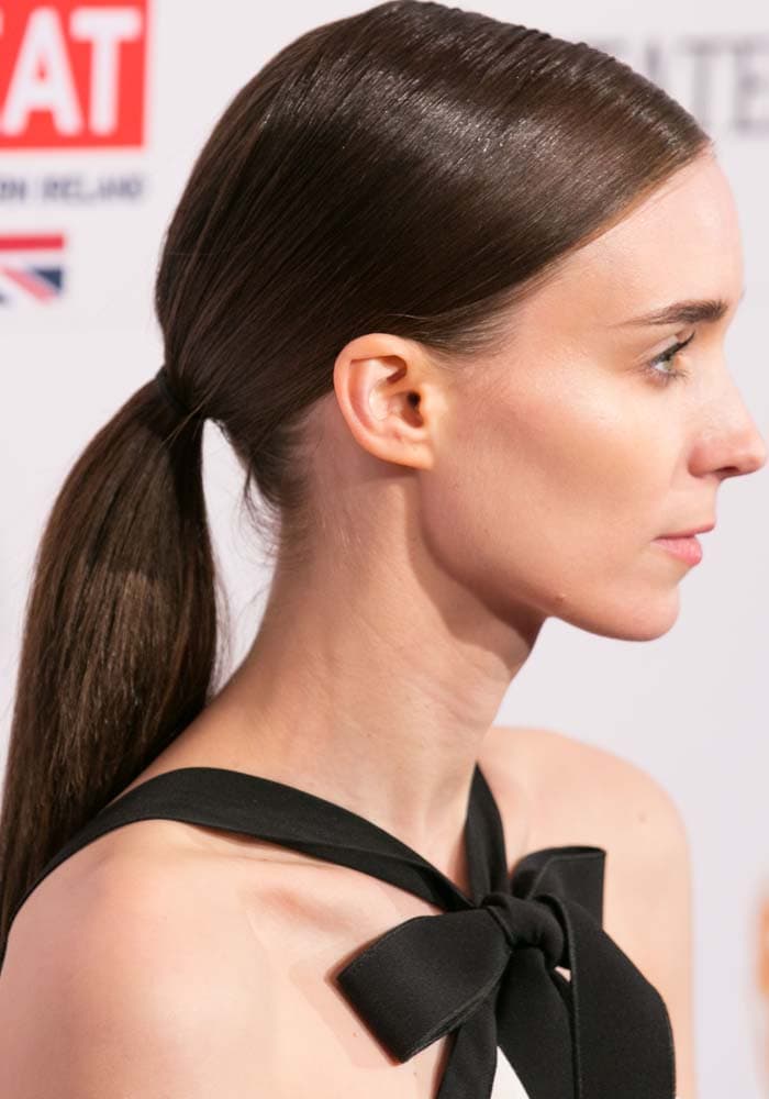 Rooney Mara wears her hair back in a simple ponytail