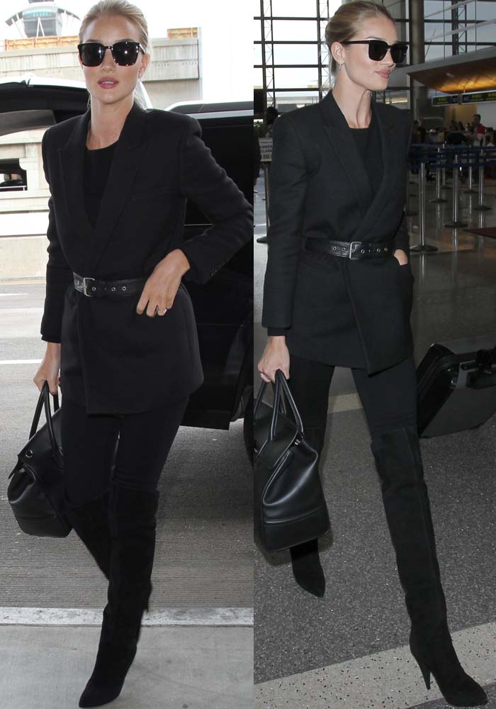 Rosie Huntington-Whiteley arrives at LAX in an all-black ensemble, pairing a tailored Saint Laurent blazer with matching skinny jeans and suede over-the-knee boots for a sleek, travel-ready look