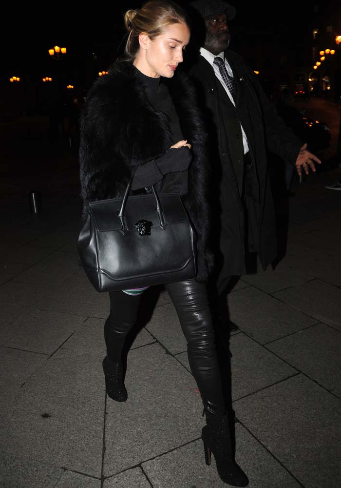 Rosie Huntington-Whiteley attends Paris Haute Couture Week in a chic all-black suede, leather and fur ensemble
