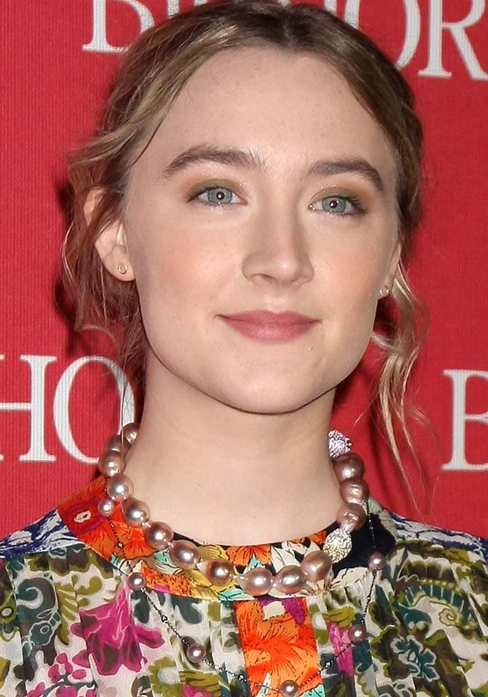 Saoirse Ronan wears her hair back at the 27th Annual Palm Springs International Film Festival