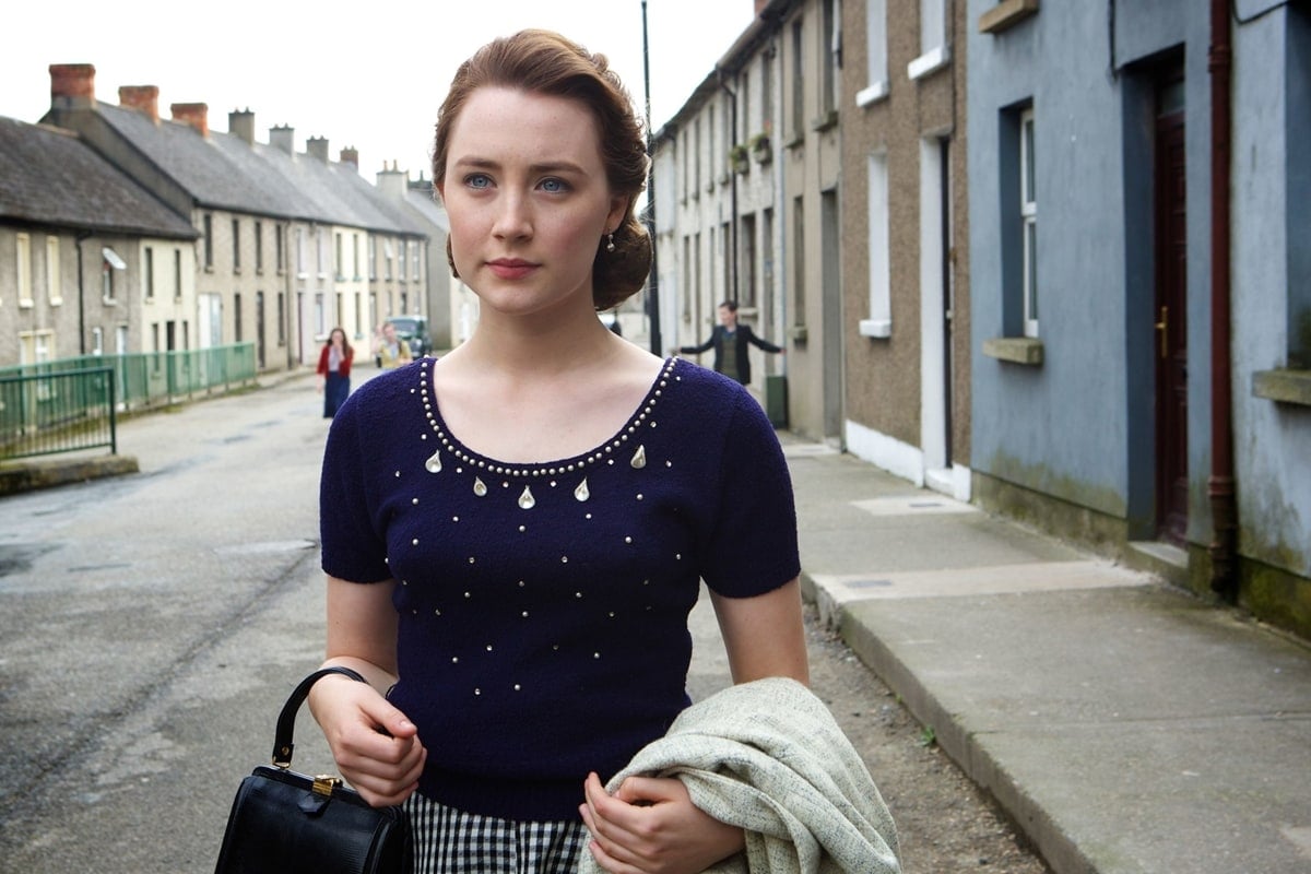 Saoirse Ronan portrays Eilis Lacey, an intelligent young woman from southeast Ireland who emigrates to New York City in 1951