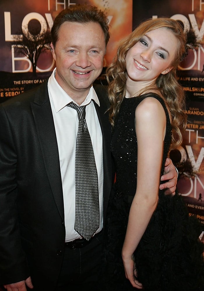 Saoirse Ronan posing with her father Paul Ronan at the Irish premiere of The Lovely Bones