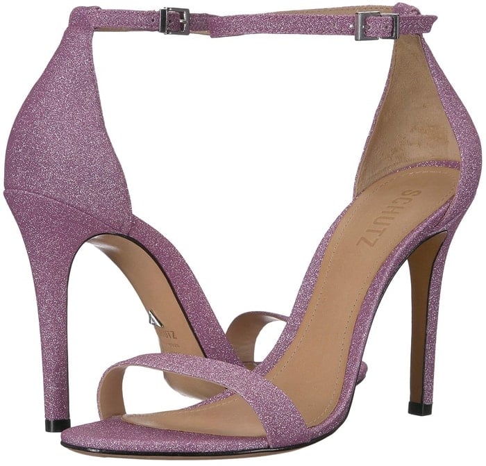 An elegant high-heel sandal features simple styling and a slim ankle strap