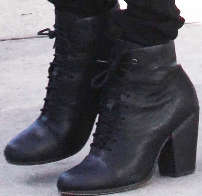Taylor Swift wears a pair of lace-up Rag & Bone booties