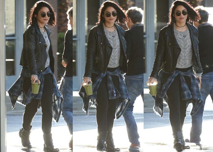 Vanessa Hudgens styled her Dolce Vita boots with a gray knit sweater and a leather jacket, adding a plaid flannel tied at the waist for a casual grunge vibe, while her sleek, shoulder-length hair and round sunglasses completed the effortlessly cool ensemble