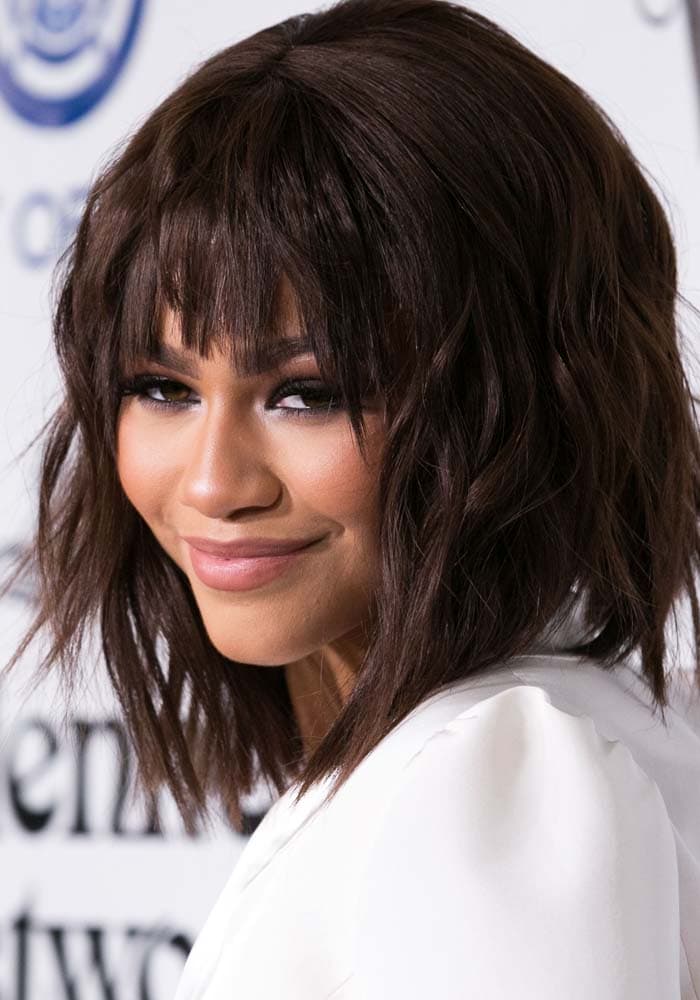 Zendaya wears her hair in a textured lob at the Art of Elysium 2016 HEAVEN Gala