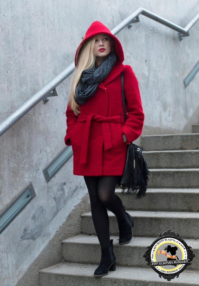 Ewa looking stylish in black stockings and a red coat