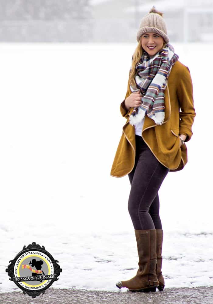 Rachel paired a mustard jacket with jeans and boots