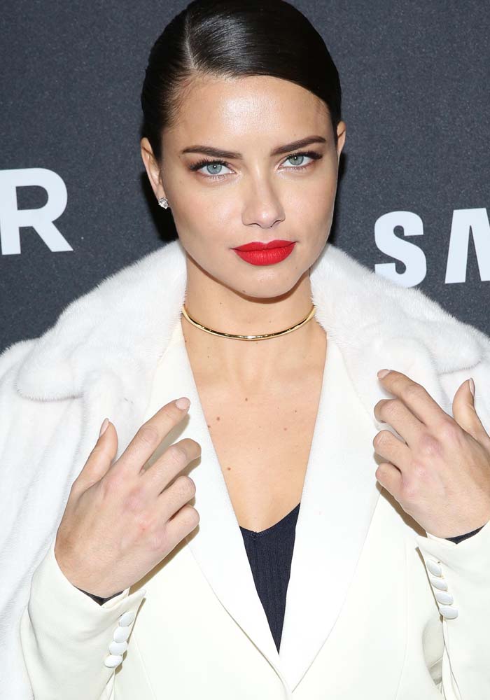 Adriana Lima slicks her hair back for the "Zoolander No. 2" premiere