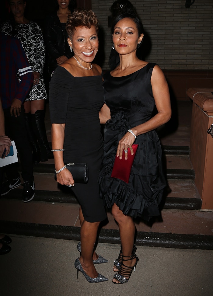 Jada Pinkett Smith poses with her mother, Adrienne Banfield-Norris, both elegantly dressed in black, highlighting their impeccable style and grace