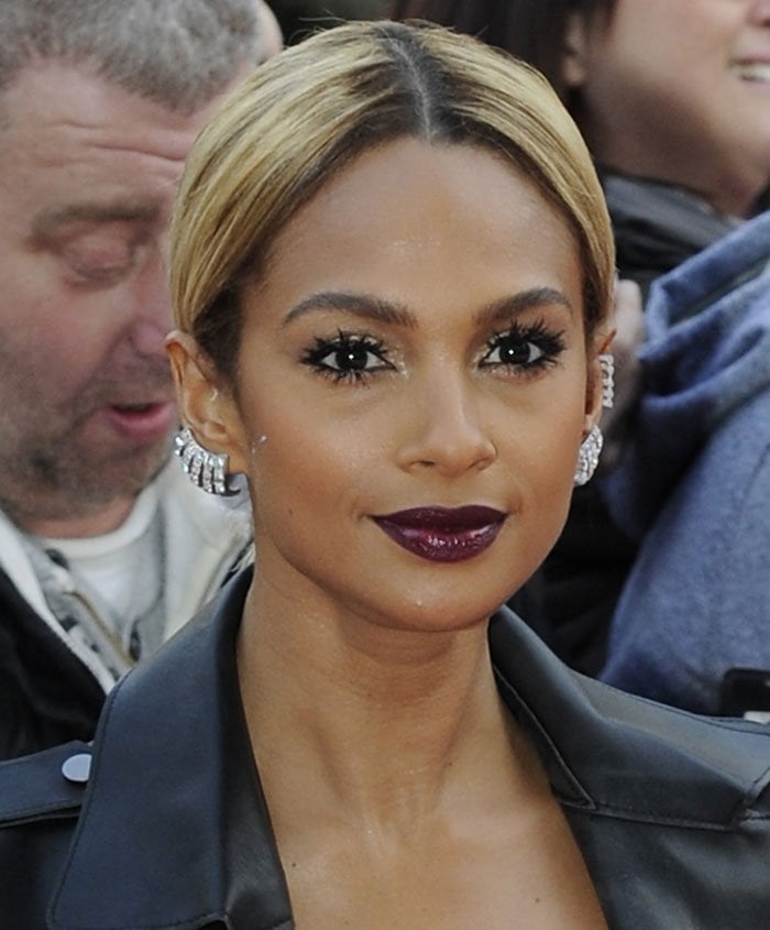 Alesha Dixon wears plum lipstick and dramatic eyelashes