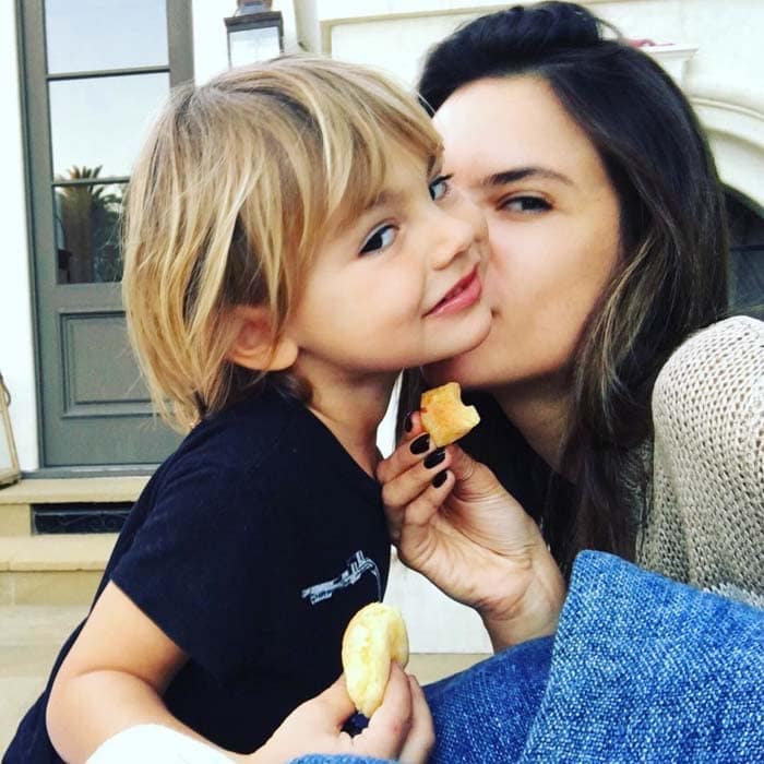 Alessandra Ambrosio shares a sweet and candid moment with her son, Noah Phoenix Ambrosio Mazur, as they enjoy a cozy snack together at home