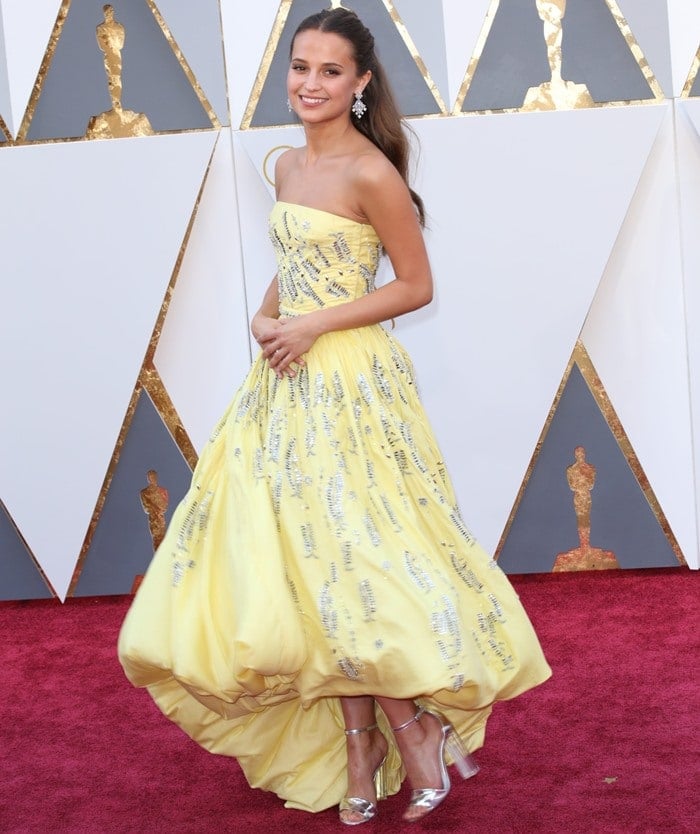 Alicia Vikander stuns on the red carpet in a head-to-toe Louis Vuitton ensemble