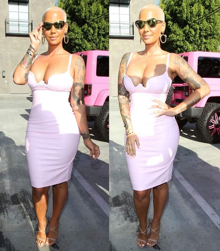 Amber Rose rocks a body-hugging light pink dress at Kitson