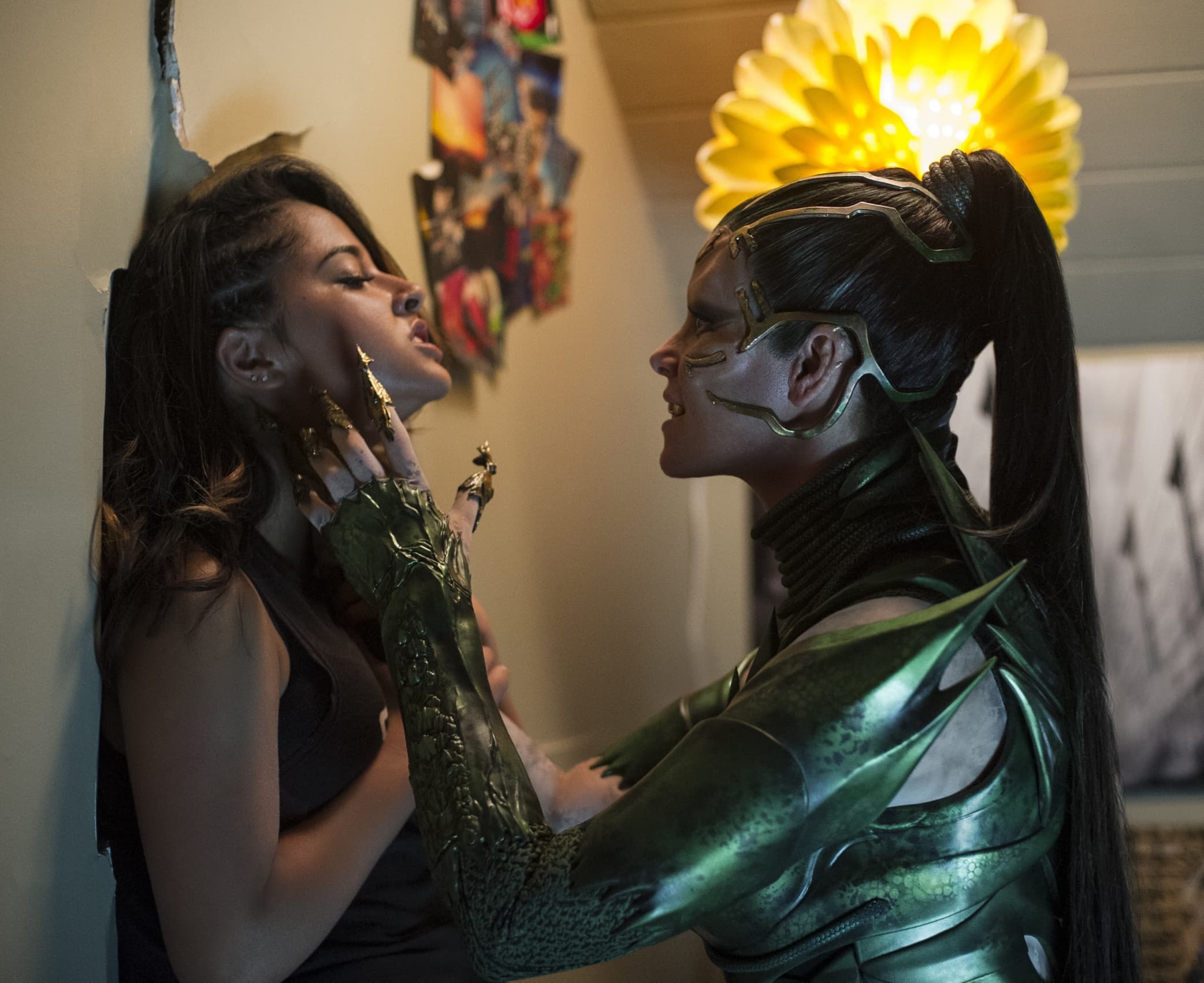 Becky G as Trini Kwan and Elizabeth Banks as Rita Repulsa in the 2017 American superhero film Power Rangers