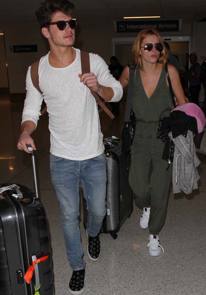 Bella Thorne and boyfriend Gregg Sulkin arrive at LAX after a weekend in Mexico