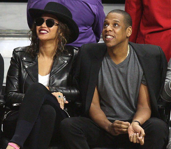 Beyonce and Jay-Z attend a Clippers game in coordinating monochrome looks