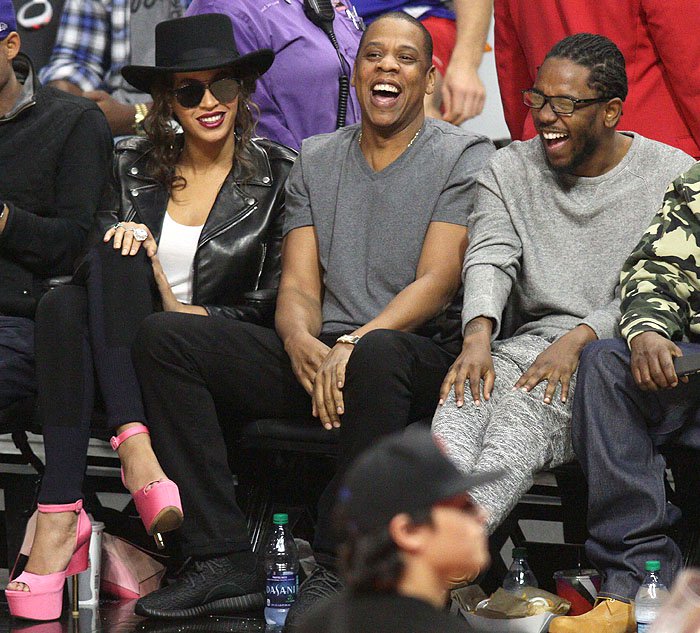 Beyonce, Jay-Z and Kendrick Lamar laugh at an LA Clippers game