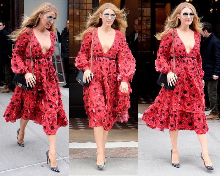 Blake Lively leaving her hotel in a long sleeve red and black floral v-neck belted flare dress