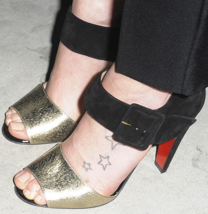 Daisy Ridley shows off her sexy bare feet in Trezotro buckle-strap sandals from Christian Louboutin