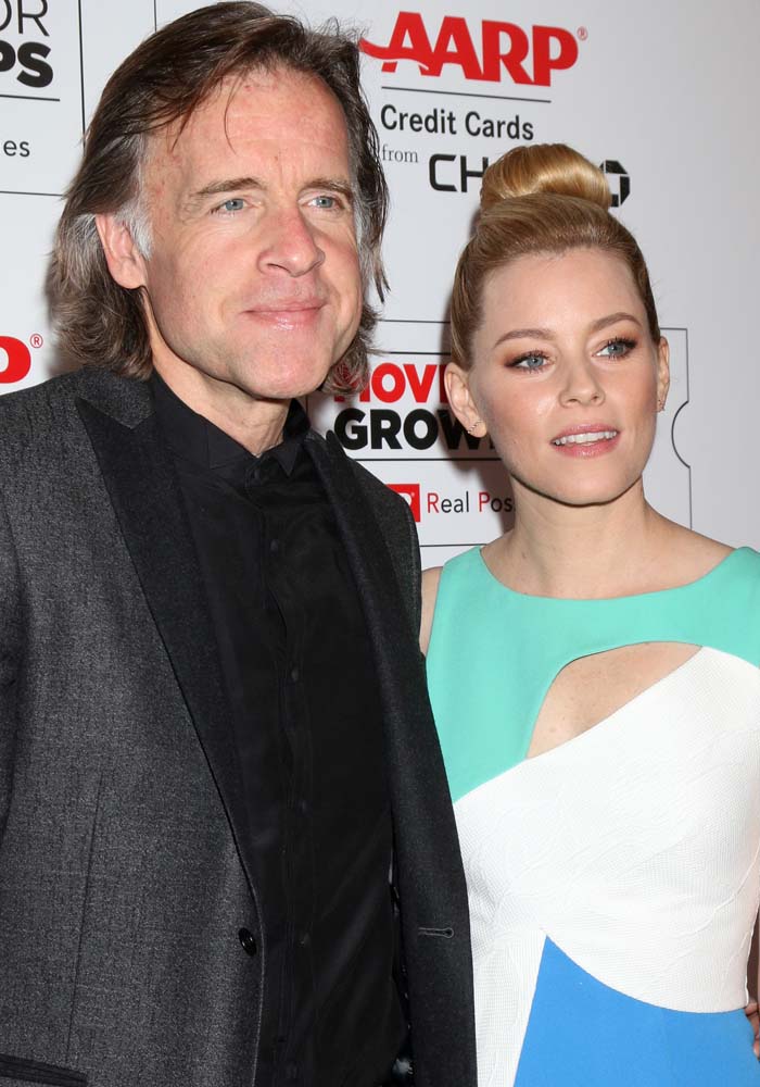 "Love and Mercy" director Bill Pohland and Elizabeth Banks pose for photos together