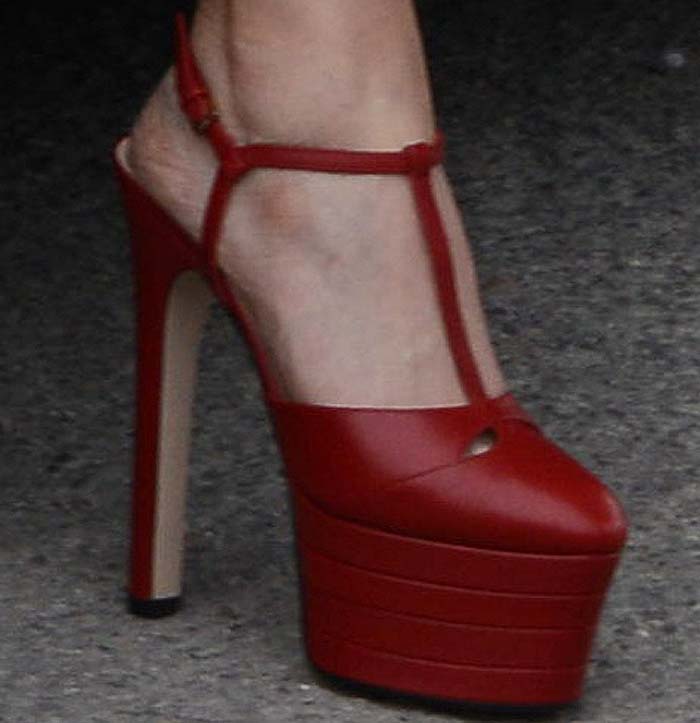 Elizabeth Olsen's feet in bright red Gucci platform heels
