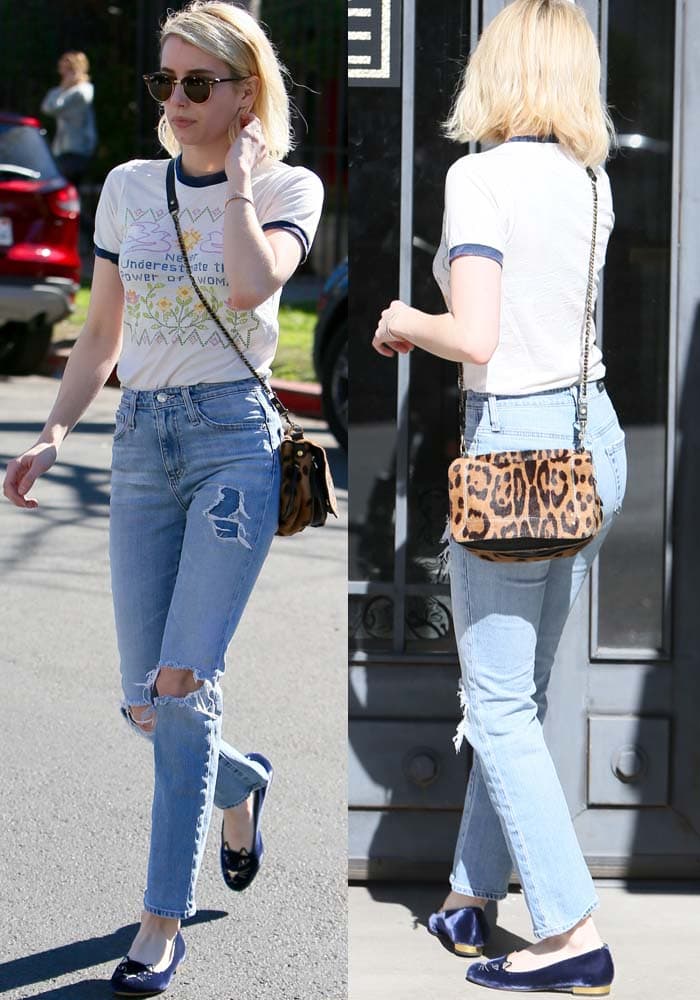 Emma Roberts wore high-waisted straight leg jeans with a leopard print satchel