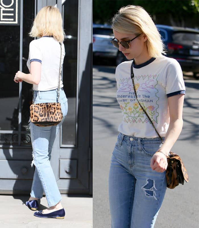 Emma Roberts wearing a feminist slogan tee that reads "Never Underestimate the Power of a Woman" with Alexa Chung's Sabine high-rise jeans from AG