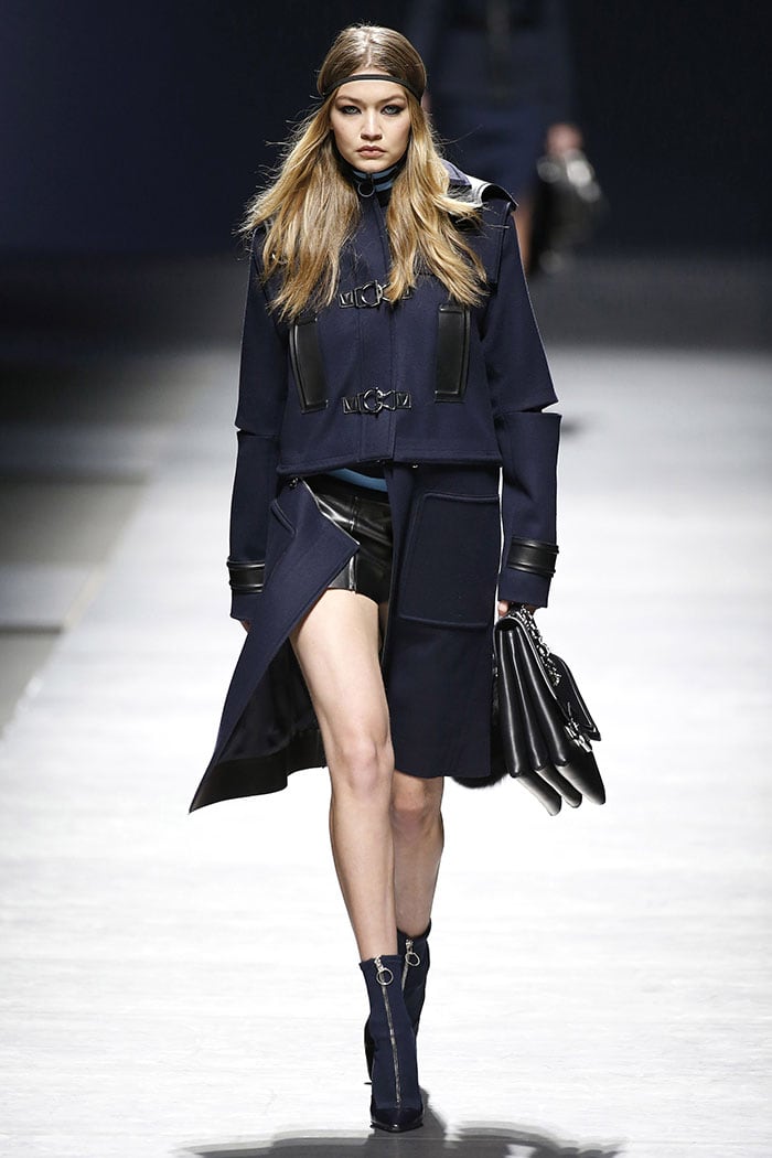 Gigi Hadid modelling the scuba pumps-boots on the Versace fall 2016 fashion show runway.