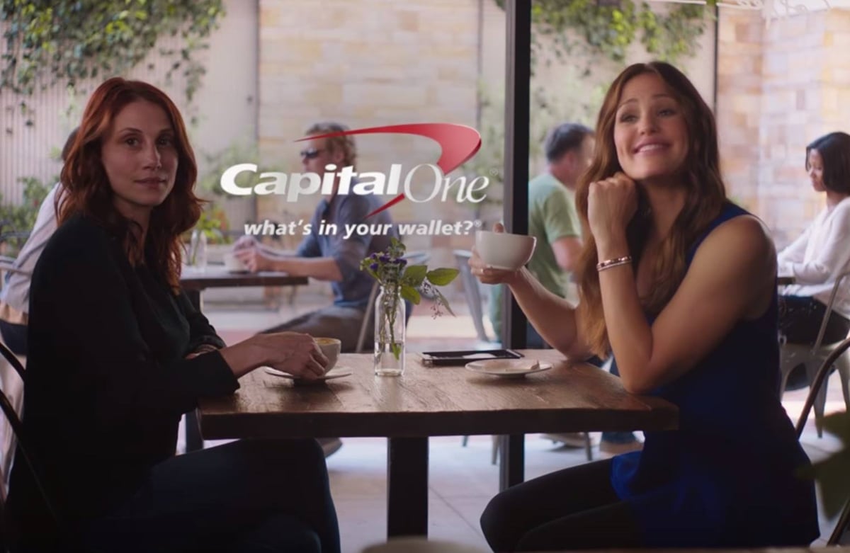 Gena Shaw and Jennifer Garner in a commercial for the Capital One Venture Air Miles credit card