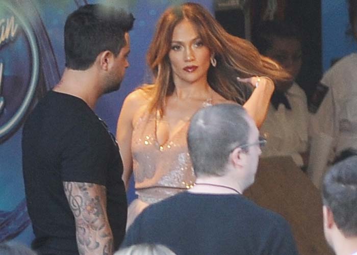 Jennifer Lopez mills around backstage at the "American Idol" finale show in Los Angeles