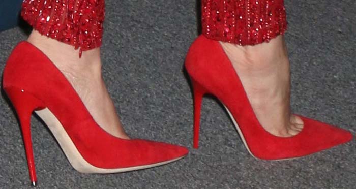 Jennifer Lopez slips into the classic Jimmy Choo 'Abel' Pumps in red suede