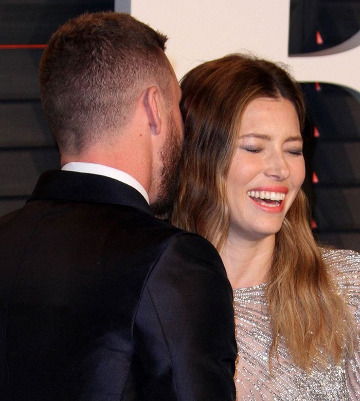 Justin Timberlake kisses Jessica Biel's hair at the 2016 Vanity Fair Oscar Party