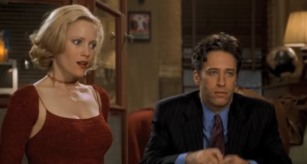 Leslie Mann with fake boobs as Corinne Maloney and Jon Stewart as Kevin Gerrity in Big Daddy