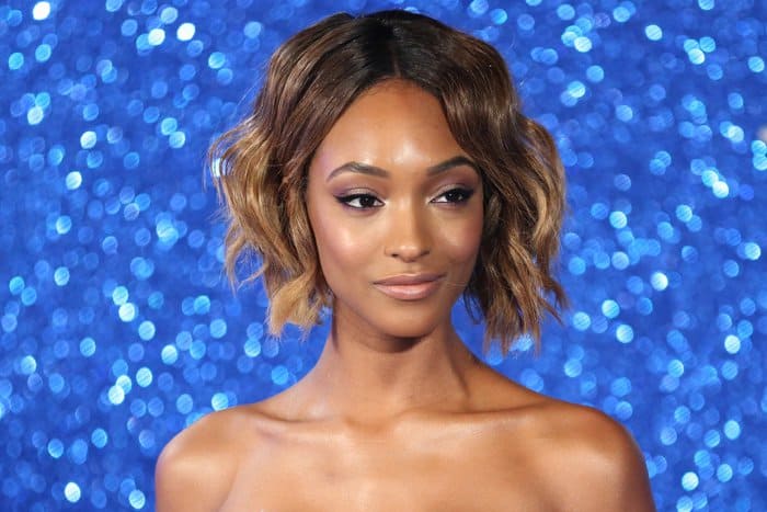 Jourdan Dunn's curly bob hairstyle added a touch of playfulness to the overall look at the Fashionable Screening of ‘Zoolander No.2’ held at the Empire Leicester Square