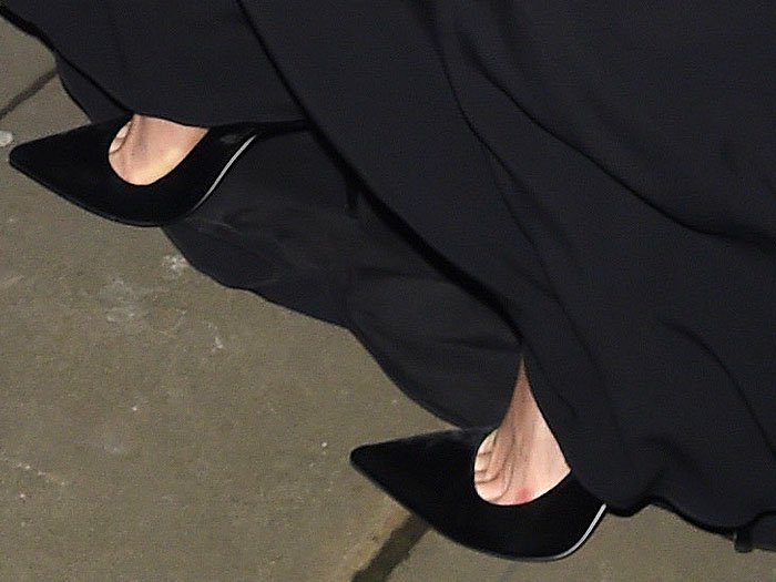 Karlie Kloss's feet in black Tamara heels