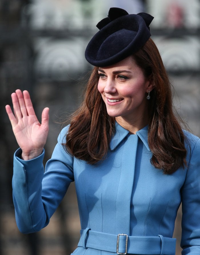 Duchess of Cambridge Kate Middleton wears her hair down as she arrives at the St. Clement Danes church in Westminster London for the 75th anniversary church service commemorating the Royal Air Force Cadets