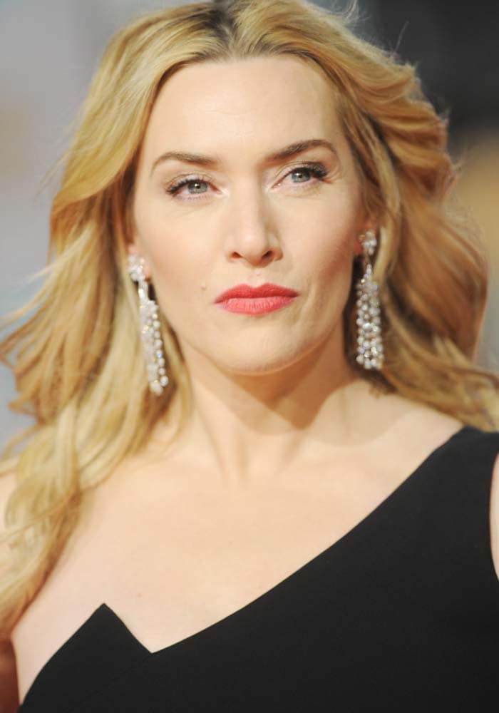 Kate Winslet wears her blonde hair in curls at the British Academy Film Awards