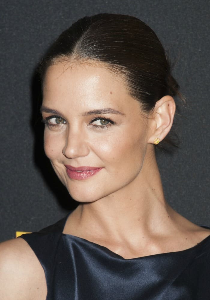 Katie Holmes graced the New York premiere of her upcoming film, Touched With Fire, in a stunning navy gown, exuding a classy aura