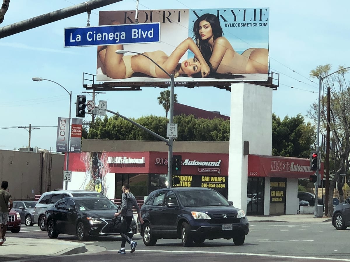 Kylie Cosmetics billboard featuring Kylie Jenner and Kourtney Kardashian in West Hollywood